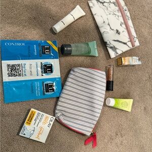 Marble and Striped Cosmetic Bags with Skincare Samples